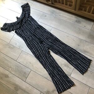 See you Monday off the shoulder striped ruffle jumpsuit. Size L